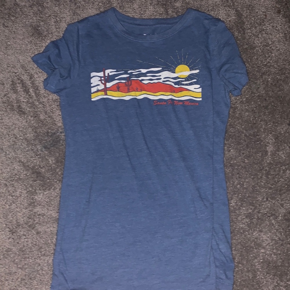 blue shirt with a picture of a sunset!